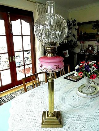 A Victorian Pink Decorative Font Doric Column Twin Duplex Oil Lamp