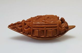 A Fine Quality Inscribed Miniature Olive Stone Carving Of A Boat.  Poem & Signed
