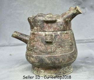 10.  4 " Ancient Old China Bronze Ware Dynasty People Face Drinking Vessel Wine Pot