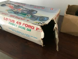 Large Lotus 49 ford F - 1 tin race car 14 inches long.  Japan Asahi Near 12