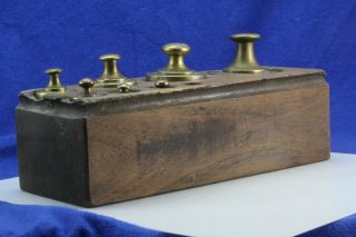 Antique Balance Scale Weights In Wood Block. 5