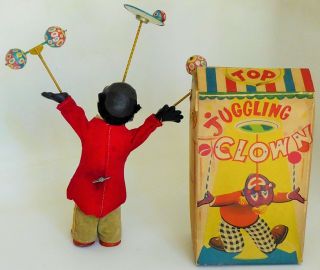 ALPS R.  F.  JUGGLING CLOWN AFRO - AMERICAN VERSION TIN LITHO WIND UP 10 