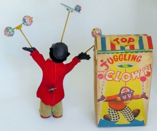 ALPS R.  F.  JUGGLING CLOWN AFRO - AMERICAN VERSION TIN LITHO WIND UP 10 