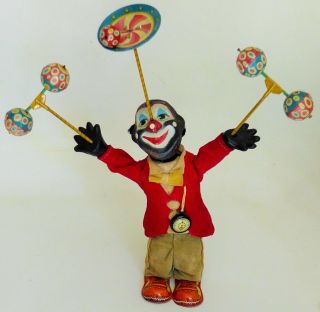 ALPS R.  F.  JUGGLING CLOWN AFRO - AMERICAN VERSION TIN LITHO WIND UP 10 