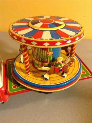 TN NOMURA FRICTION TRUCK MERRY GO ROUND TIN LITHO CLOWN CIRCUS TRUCK CAROUSEL 6