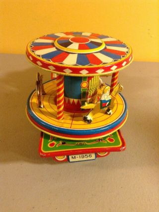 TN NOMURA FRICTION TRUCK MERRY GO ROUND TIN LITHO CLOWN CIRCUS TRUCK CAROUSEL 7