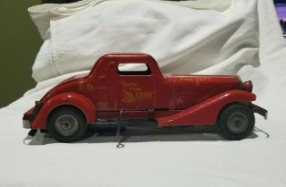 Louis Marx & Co Siren Fire Chief Red Care