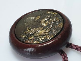A Fine Edo Period Shakudo & Lacquer Kagamibuta Netsuke.  Ryūjin.  Dragon king. 2
