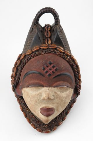 African tribal art.  Punu maiden mask. 3