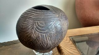 An Abelam coconut shell water vessel from Kuminimbus Village,  mid 20th century, 7