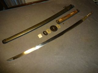 Japanese WWll NLF officer ' s sword in type 44 mountings Gendaito 
