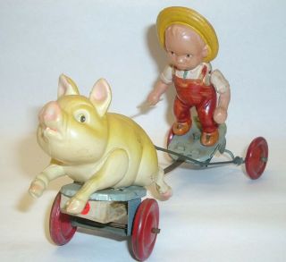 Farmer Swinging Stick Chases Squealing Pig Runs Tin & Celluloid Windup Toy Japan