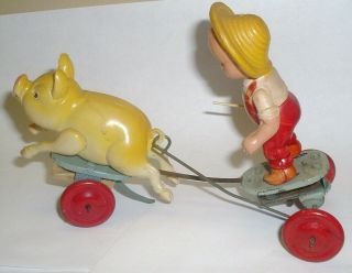 FARMER SWINGING STICK CHASES SQUEALING PIG RUNS TIN & CELLULOID WINDUP TOY JAPAN 2