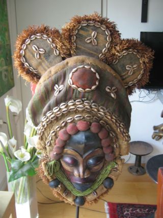 African Mask Dan Tribe Liberia Burnished Wood,  Cowrie Shells,  Bells,  Beads