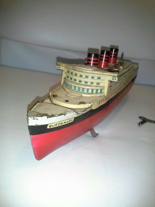 Tin RMS Queen Mary wind up floating toy with key 2