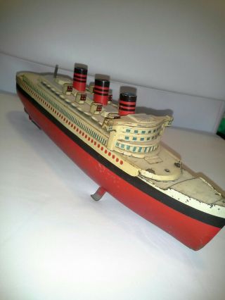 Tin RMS Queen Mary wind up floating toy with key 6