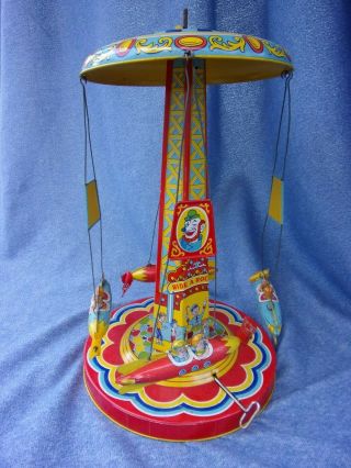 Vg 1950s J.  Chein Ride A Rocket Carnival Circus Ride Windup Tin Toy