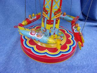 VG 1950s J.  Chein RIDE A ROCKET Carnival Circus Ride Windup Tin Toy 5
