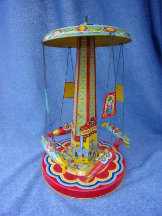 VG 1950s J.  Chein RIDE A ROCKET Carnival Circus Ride Windup Tin Toy 8