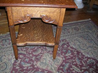 very fine antique quartersawn oak library table fluted legs wonderful carvings 10