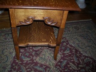 very fine antique quartersawn oak library table fluted legs wonderful carvings 9