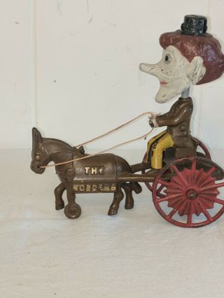 Antique Cast Iron Pull Toy The Nodders Man