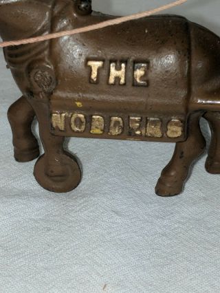 ANTIQUE CAST IRON PULL TOY THE NODDERS MAN 6