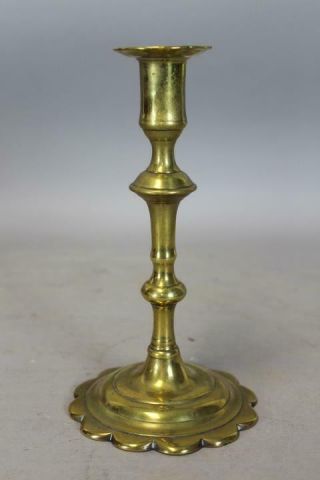 An Early 18th C English Qa Brass Candlestick Baluster Form Great Petal Base