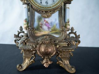 Sevres clock with hand painted porcelain inserts,  Bronze and beautifully ornate 2