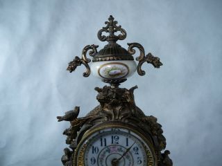 Sevres clock with hand painted porcelain inserts,  Bronze and beautifully ornate 4