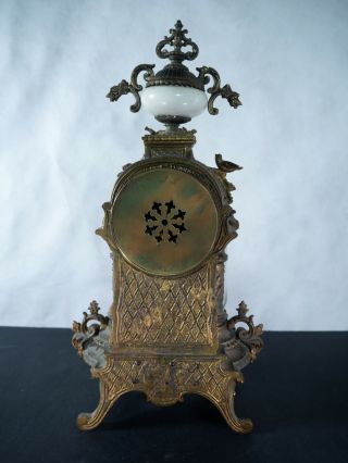 Sevres clock with hand painted porcelain inserts,  Bronze and beautifully ornate 6