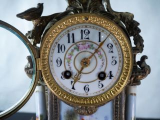 Sevres clock with hand painted porcelain inserts,  Bronze and beautifully ornate 7