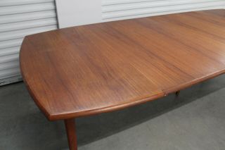 Danish Mid Century Teak Ext.  Dining Table 106 in.  with 2 leaves 10