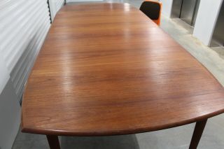Danish Mid Century Teak Ext.  Dining Table 106 in.  with 2 leaves 11