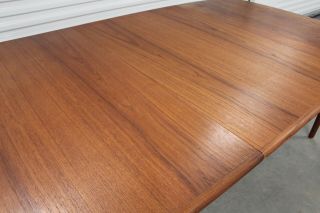 Danish Mid Century Teak Ext.  Dining Table 106 in.  with 2 leaves 2
