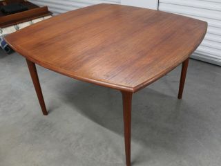 Danish Mid Century Teak Ext.  Dining Table 106 in.  with 2 leaves 4