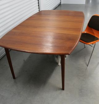 Danish Mid Century Teak Ext.  Dining Table 106 in.  with 2 leaves 8