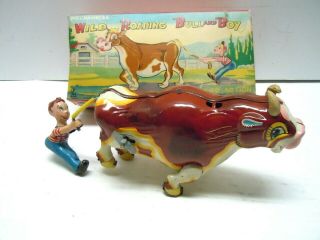 1955 Mikuni Japan Wild Roaring Bull And Boy.  Mechanical Wind Up Toy.  A,