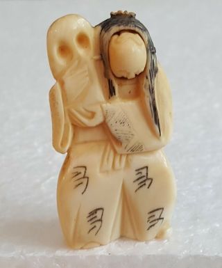 Detailed Hand Carved Japanese Bovine Bone Netsuke Man With Revolving Face 3
