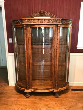 Light Wood Large Curio Cabinet,  Must Go By 7/6,  With Glass Shelves And Claw Feet