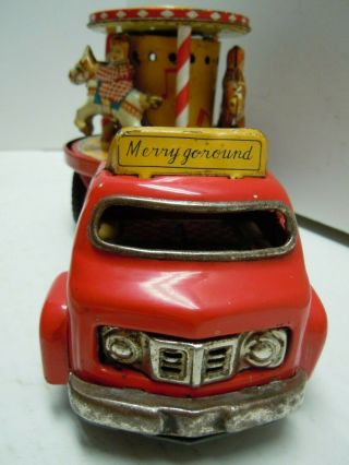 Vintage Japan TN Tin Battery Op.  1950 ' s Merry Go Round Carousel Truck.  RUNS.  NR 3