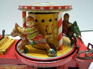 Vintage Japan TN Tin Battery Op.  1950 ' s Merry Go Round Carousel Truck.  RUNS.  NR 5