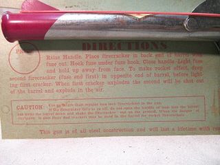 VINTAGE 1943 FIRECRACKER ROCKET PISTOL ON CARD JUNCTION CITY KS LABEL GUN 3