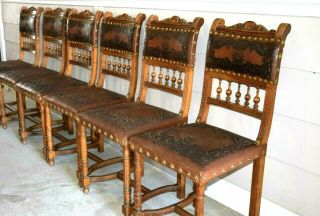 Six Vintage Spanish Revival Embossed leather Dining Chairs w Decorative Nails 2