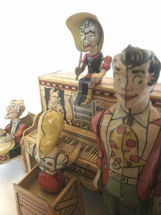 Vintage Lil‘ Abner & The Dog Patch 4 Man Band Tin Litho Wind Up Toy.  It 2