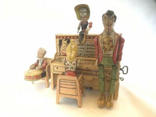 Vintage Lil‘ Abner & The Dog Patch 4 Man Band Tin Litho Wind Up Toy.  It 5