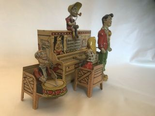 Vintage Lil‘ Abner & The Dog Patch 4 Man Band Tin Litho Wind Up Toy.  It 7