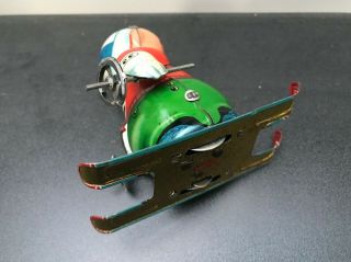 Vintage 1960 ' SKIING DOLL,  shopstock -,  made in China Shanghai,  tin toy 10
