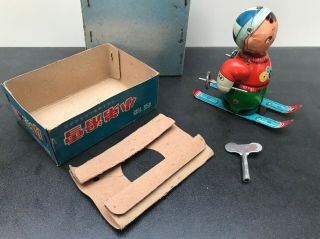 Vintage 1960 ' SKIING DOLL,  shopstock -,  made in China Shanghai,  tin toy 3
