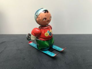 Vintage 1960 ' SKIING DOLL,  shopstock -,  made in China Shanghai,  tin toy 5